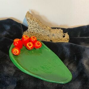 Handmade prickly pear paddle with bright red tuna